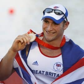 Britain's Aggar shows gold medal after winning men's single sculls at Beijing Paralympics