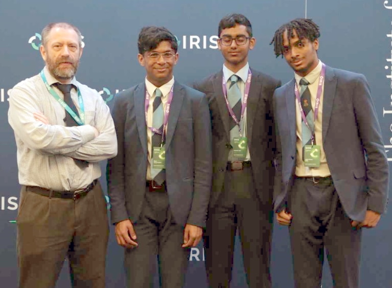 “Above and beyond”: sixth-formers’ robot research presentation wins plaudits for QE